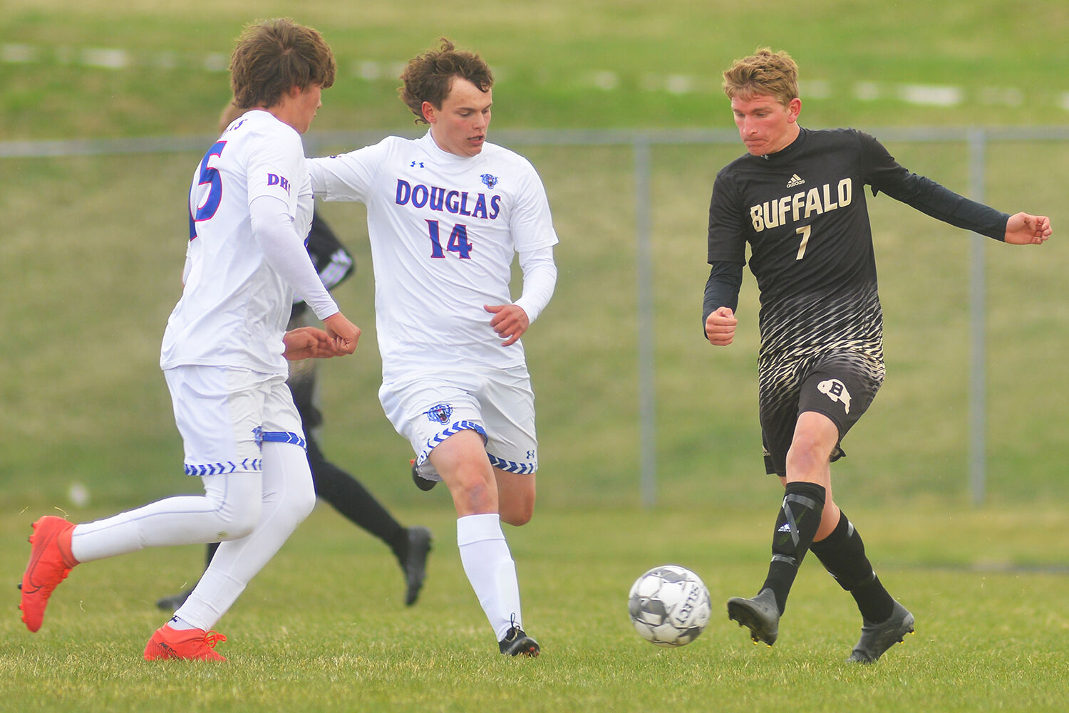 Taylor Swanston clears the ball downfield